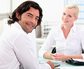 Businessman and Businesswoman - Fraud Prevention